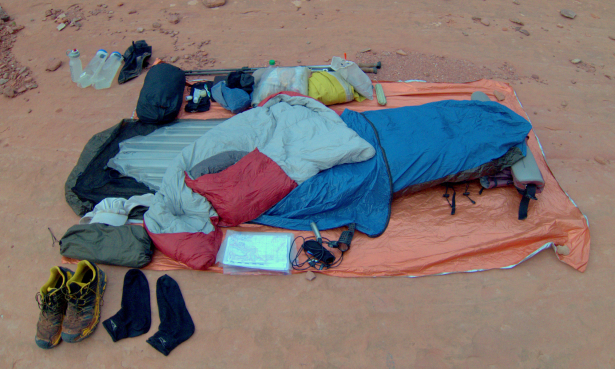 A slickrock camp one night in southern Utah in April. Even when used without a bivy, the Backcountry Quilt is far less drafty than conventional quilts due to its generous size, hideaway hood, and full-length insulated arm sleeves.