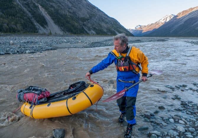 Roman preparing to packraft the Chitistone River in Wrangell-St. Elias National Park, Alaska