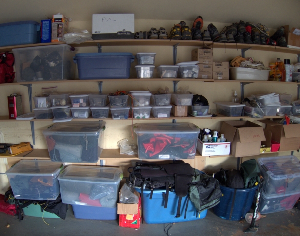 Shelving & tubs in the garage for large items and small -- pots, shelters, compasses, water treatment, etc.