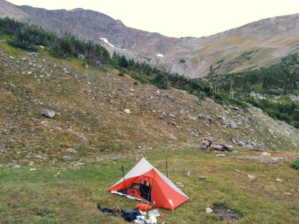 Our camp below James Peak, a 13'er. To use the High Route 1FL successfully as a 2-person shelter, it's best to have a protected campsite and friendly weather. We had neither, but still managed.