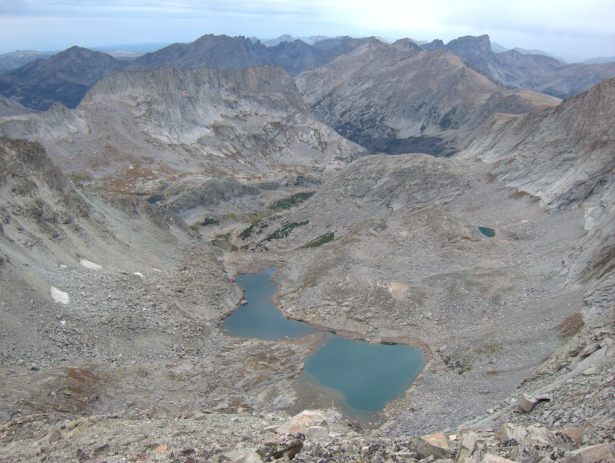 Lake 11,185 as seen from near the summit of Wind River Peak, which as the range’s southernmost 13,000-foot mountain was a distinct landmark for pioneers. This is a fitting start to the route: on a clear day, it’s possible to see the range’s northern high peaks. While I didn’t have those views, I was happy to at least get up and down it before the afternoon rains.
